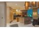 Modern kitchen design with stainless steel appliances, island bar, and city views at 2747 Paradise Rd # Ph 3604, Las Vegas, NV 89109