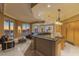Modern kitchen design with stainless steel appliances, island bar, and city views at 2747 Paradise Rd # Ph 3604, Las Vegas, NV 89109
