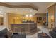 Bright, open kitchen with wooden cabinets, an island with seating, and modern appliances perfect for entertaining at 2747 Paradise Rd # Ph 3604, Las Vegas, NV 89109