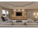 Contemporary living room with an entertainment center, neutral-colored sofa and city views at 2747 Paradise Rd # Ph 3604, Las Vegas, NV 89109
