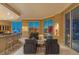 Comfortable seating area with amazing city views, showcasing an open floor plan adjacent to a modern kitchen setup at 2747 Paradise Rd # Ph 3604, Las Vegas, NV 89109