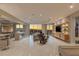 Modern living space with a bar, an entertainment center, marble flooring and city views at 2747 Paradise Rd # Ph 3604, Las Vegas, NV 89109