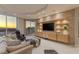 Beautiful living room with an entertainment center, marble floors and incredible city views at 2747 Paradise Rd # Ph 3604, Las Vegas, NV 89109