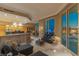 Spacious living area and kitchen featuring an open layout, contemporary décor, and panoramic views of the city skyline at 2747 Paradise Rd # Ph 3604, Las Vegas, NV 89109