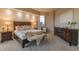 Relaxing bedroom with dark furniture, light neutral palette, and calming natural light at 2747 Paradise Rd # Ph 3604, Las Vegas, NV 89109