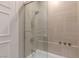 Tiled shower with glass door and rain shower head at 2747 Paradise Rd # Ph 3604, Las Vegas, NV 89109
