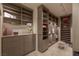 Spacious walk-in closet featuring custom shelving and storage solutions for optimal organization and style at 2747 Paradise Rd # Ph 3604, Las Vegas, NV 89109