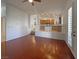 Living room with hardwood floors, ceiling fan, and access to kitchen and other rooms at 2756 Blairgowrie Dr, Henderson, NV 89044