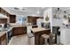 This kitchen features dark cabinetry, tile countertops, and stainless steel appliances at 4301 Fortune Ave, Las Vegas, NV 89107