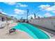 Backyard pool area featuring a sparkling pool, patio, and landscaped surroundings at 4301 Fortune Ave, Las Vegas, NV 89107