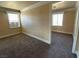 Cozy bedrooms with neutral walls, carpet flooring, and bright windows at 4320 Tiger Rd, Pahrump, NV 89048