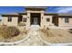 Inviting single-story home featuring a paved walkway leading to the front entrance at 4320 Tiger Rd, Pahrump, NV 89048