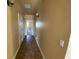 Hallway features neutral walls and lighting at 4320 Tiger Rd, Pahrump, NV 89048