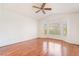 Bright, spacious bedroom with hardwood floors, ceiling fan, and lots of natural light at 502 Edgefield Ridge Pl, Henderson, NV 89012