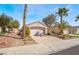 Single story home with desert landscaping, and a spacious two car driveway at 502 Edgefield Ridge Pl, Henderson, NV 89012