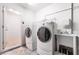 Laundry Room features a utility sink and new washer and dryer at 502 Edgefield Ridge Pl, Henderson, NV 89012