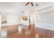 Spacious living room featuring hardwood floors and an open-concept design at 502 Edgefield Ridge Pl, Henderson, NV 89012