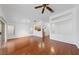 Spacious living room with light, neutral walls and glossy hardwood flooring at 502 Edgefield Ridge Pl, Henderson, NV 89012