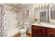 Cozy bathroom features vanity, toilet, and bathtub at 5166 Gray Ln # M, Las Vegas, NV 89119