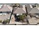 The aerial view shows a backyard with desert landscaping and covered patio at 5323 Farley Feather Ct, North Las Vegas, NV 89031