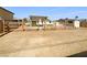 Large backyard with wood fence and pergola over a cement patio at 5413 Avenida Caballo, Las Vegas, NV 89108