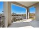 Open-air balcony showing neighborhood and mountain views on a sunny day at 59 Strada Loreto, Henderson, NV 89011