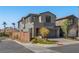 Contemporary two-story home with a two-car garage and tidy front yard landscaping at 59 Strada Loreto, Henderson, NV 89011