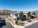 Beautiful two-story home with a well-manicured front yard, featuring modern architecture and a two-car garage at 59 Strada Loreto, Henderson, NV 89011