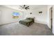 Large main bedroom with mountain views, carpet flooring, and a walk-in closet at 59 Strada Loreto, Henderson, NV 89011