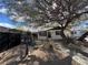 Charming home with a drought tolerant front yard, black fence and desert landscaping with an ornate mailbox at 617 S 9Th St, Las Vegas, NV 89101