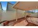 Private covered back patio with well maintained fence at 6190 Tillman Crest Ave, Las Vegas, NV 89139