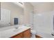 Bathroom featuring a white sink, white toilet and white shower-tub combo at 6190 Tillman Crest Ave, Las Vegas, NV 89139