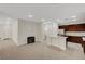 Spacious kitchen featuring tile floors, stainless steel appliances, and a kitchen island at 6190 Tillman Crest Ave, Las Vegas, NV 89139