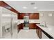 This modern kitchen features stainless steel appliances and ample counter space at 6190 Tillman Crest Ave, Las Vegas, NV 89139