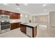 Bright kitchen with a functional island, stainless steel appliances, and ample natural light at 6190 Tillman Crest Ave, Las Vegas, NV 89139