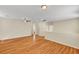 Expansive living room showcasing wood floors, neutral walls, and ample space at 6190 Tillman Crest Ave, Las Vegas, NV 89139