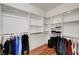 Spacious walk-in closet featuring custom shelving and ample storage space for clothes and accessories at 6190 Tillman Crest Ave, Las Vegas, NV 89139