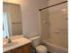 Bathroom featuring a single sink vanity, toilet and shower tub combination at 6320 Tier Ave, Las Vegas, NV 89139