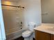 This bathroom features a shower over tub combo with tiled walls and a vanity at 6320 Tier Ave, Las Vegas, NV 89139