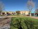 Well-maintained lawn and walking path through the park at 6320 Tier Ave, Las Vegas, NV 89139