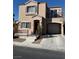 Charming two-story home with a small front yard and attached garage, great curb appeal at 6320 Tier Ave, Las Vegas, NV 89139