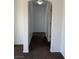 Hallway with carpet flooring that leads to rooms at 6320 Tier Ave, Las Vegas, NV 89139