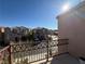 Balcony view of neighborhood homes and a mountain in the distance at 6320 Tier Ave, Las Vegas, NV 89139