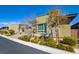 Charming single-story house with desert landscaping, a paved driveway, and contemporary architectural details at 6722 Desert Crimson St, Las Vegas, NV 89148