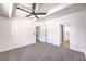 This bedroom features a ceiling fan, carpet, and neutral paint at 701 N Yale St, Las Vegas, NV 89107