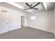 This bedroom features a ceiling fan, carpet, and neutral paint at 701 N Yale St, Las Vegas, NV 89107