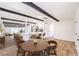 Bright living room featuring an open floor plan, beams, and wood flooring at 701 N Yale St, Las Vegas, NV 89107