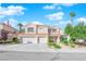 Charming two-story home with a three-car garage, mature landscaping, and a welcoming entrance at 7632 Desert Largo Ave, Las Vegas, NV 89128