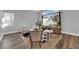 Cozy living room showcasing wood laminate flooring, a neutral color palette and natural light at 7632 Desert Largo Ave, Las Vegas, NV 89128