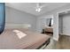 Spacious main bedroom features mirrored closet doors, hardwood floors and neutral color palette at 7632 Desert Largo Ave, Las Vegas, NV 89128